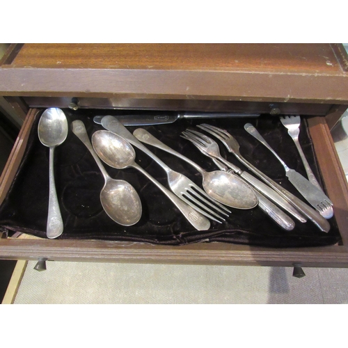 8199 - A mahogany cased six drawer cutlery storage unit containing silver plated examples from various comp... 