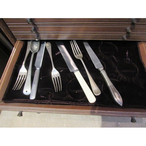 8199 - A mahogany cased six drawer cutlery storage unit containing silver plated examples from various comp... 