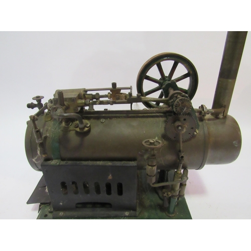 8207 - A Josef Falk overtype spirit fired horizontal steam engine, comprising of a horizontal boiler, flywh... 