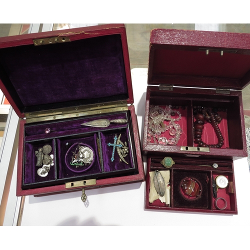 9428 - Two jewellery boxes with some contents including enamel George and the Dragon pendant, silver trowel... 