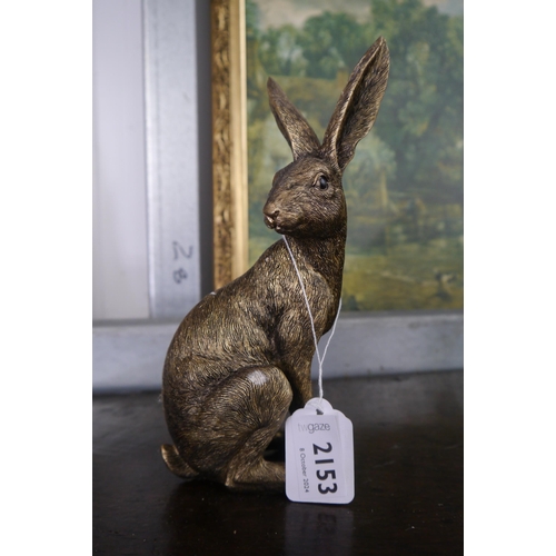 2091 - A resin bronze shelf sitting hare