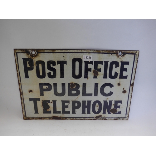 8286 - An enamel double sided Post Office telephone sign; 52cm x 35cm