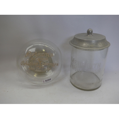 8289 - A glass Nelsons Original Gelatine Lozenges Per 2d Oz container and glass Meredith & Drew jar with al... 