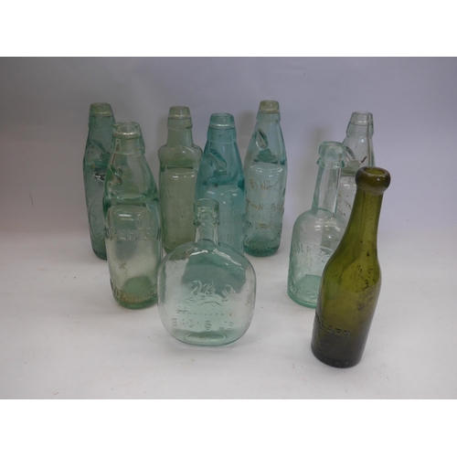 8311 - A box of mixed glass bottles including local interest Codd bottles including Yarmouth and Lowestoft