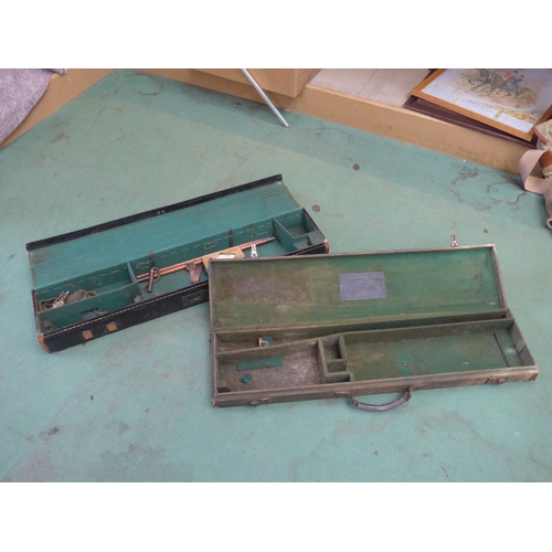 8321 - Two vintage gun cases, one with part cleaning rods