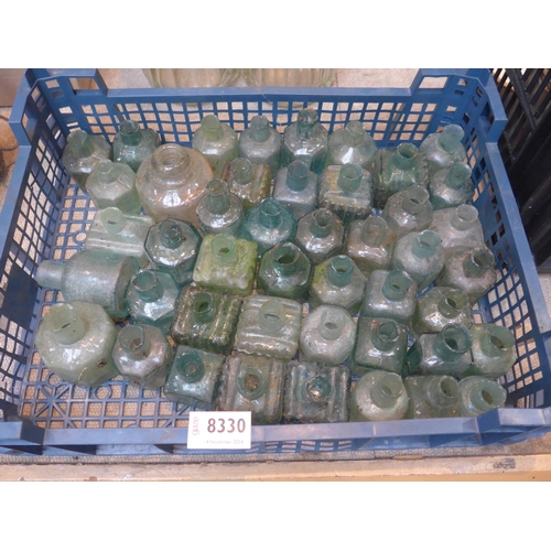 8330 - A box of glass inkwells