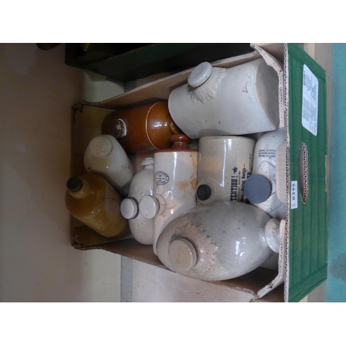 8395 - A box of assorted stoneware hot water bottles