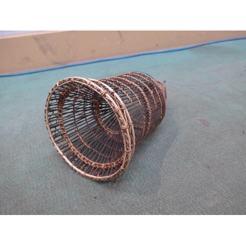 8403 - A decorative woven fish trap