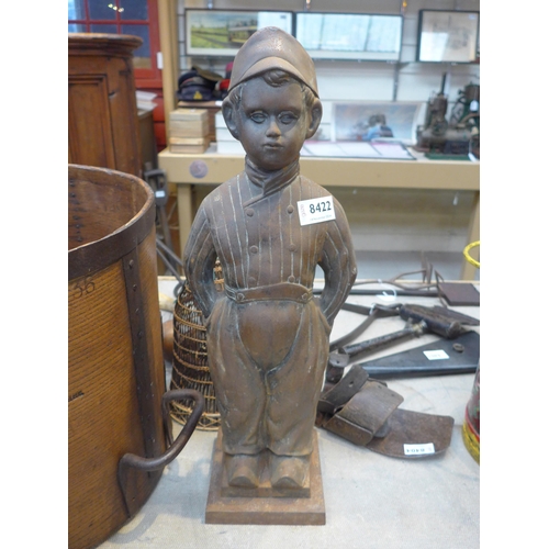 8422 - An iron companion set stand as a Dutch boy