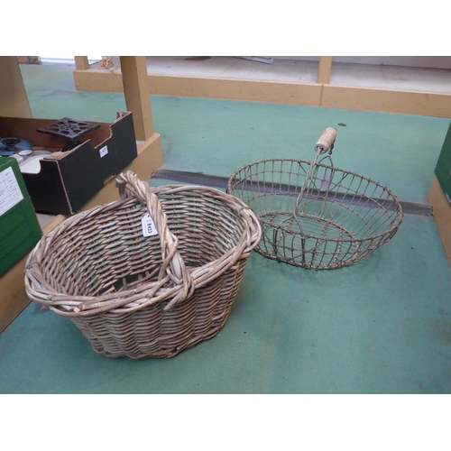 8423 - A wicker hand potato picking basket and a wire potato picking basket