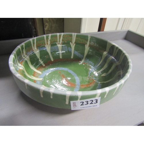 2391 - A green drip glazed bowl