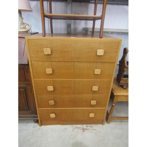 2396 - A 1950s oak chest of five drawers