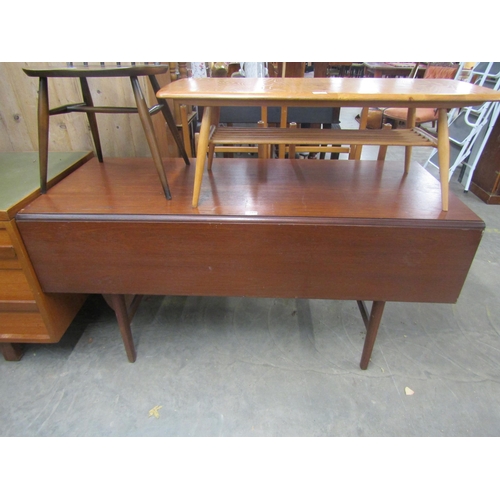 2430 - A mid Century teak drop leaf table