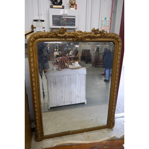 2087 - A Victorian gilt gesso overmantel wall mirror with scrolled foliate crest top and egg and dart frame... 