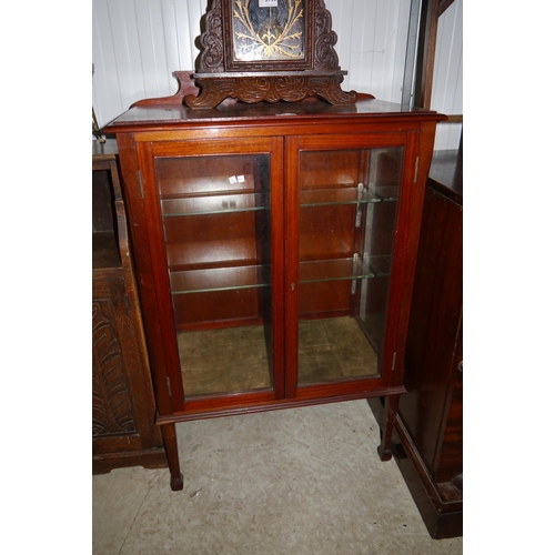 2106 - An Edwardian mahogany glazed display cabinet with shelved interior