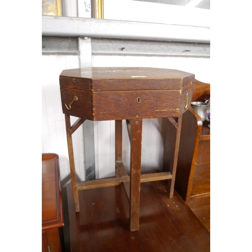 2108 - A 19th Century mahogany campaign box with brass inset handle on legs