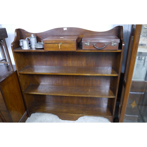 2110 - A 1930's oak four tier bookcase