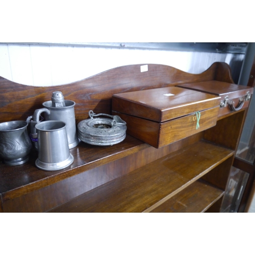 2111 - A Victorian mahogany writing box containing brass and pewter mugs and taps, and a small leather case