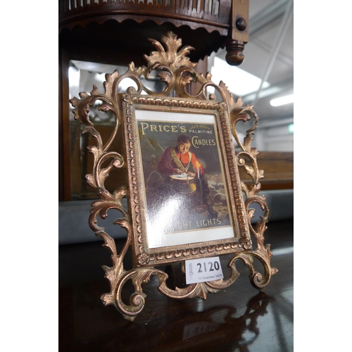 2120 - An ornate coppered picture frame prince's candles advert