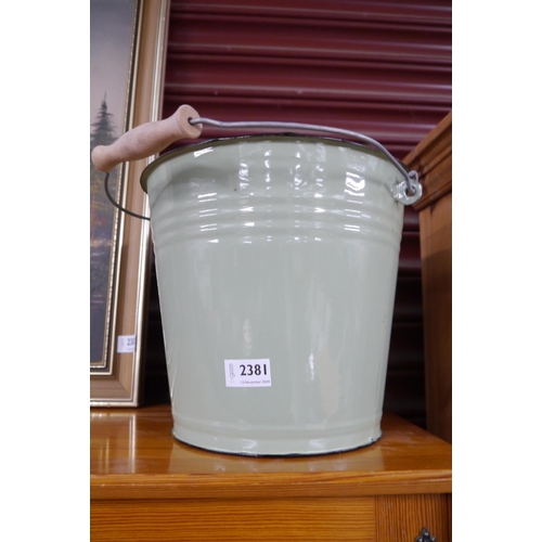 2381 - A green enamel bucket