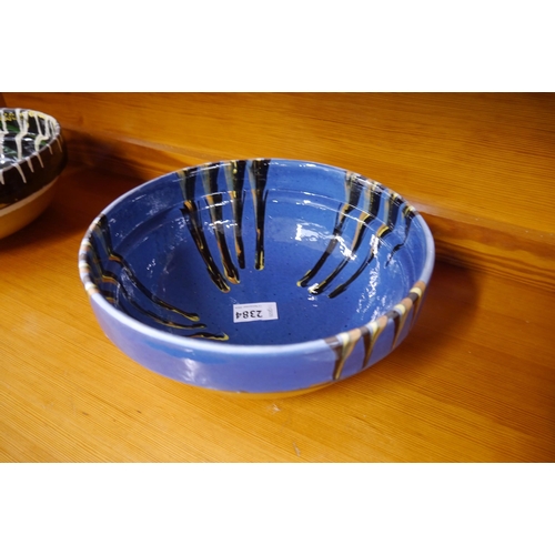 2384 - A dark blue drip glazed bowl