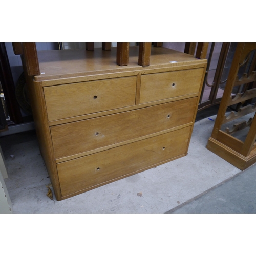 2406 - A Lebetkin Bros Ltd, oak dressing chest, two short over two graduated long drawers, lacking mirror b... 