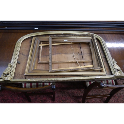 2415 - A Victorian gilt overmantel mirror frame with other gilt frames