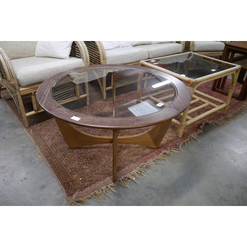 2422 - A G-Plan 'Astro' teak framed coffee table, circular form with glass top