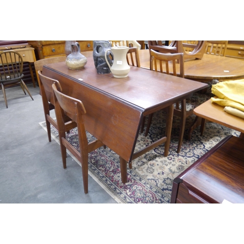 2430 - A mid Century teak drop leaf table