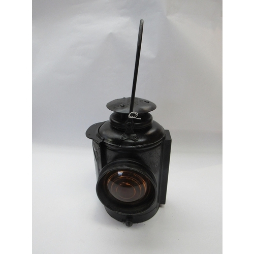 8010 - A black painted Adlake side fitting lamp with amber aspect