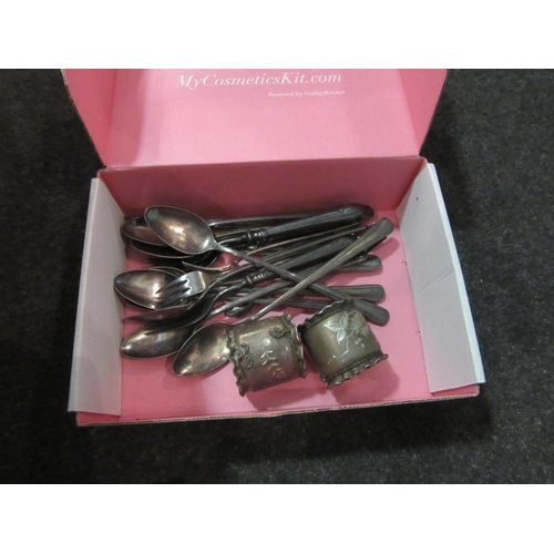 1584 - A box of silver plated and metal wares including candlesticks, cutlery, etc.