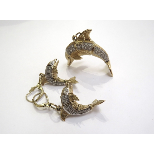 9432 - A pair of 9ct gold dolphin shaped earrings and a matching pendant all set with clear stones, 26.8g