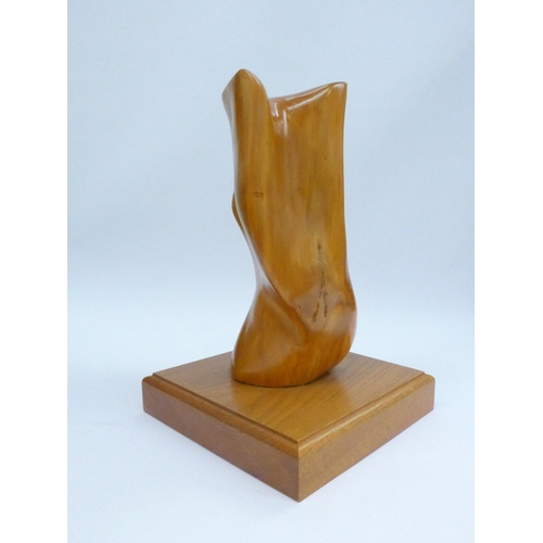 4232 - A large wooden abstract sculpture on wooden base, unsigned, 35cm high, base 24cm x 24cm