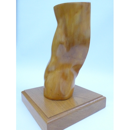 4232 - A large wooden abstract sculpture on wooden base, unsigned, 35cm high, base 24cm x 24cm