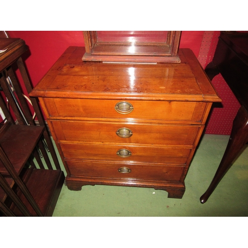 4058 - A fruitwood chest of small proportions the four drawers over bracket feet, 69cm tall x 67cm wide x 4... 