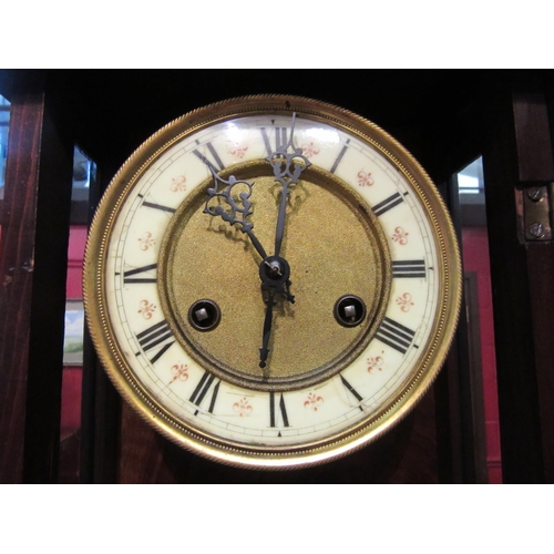 4072 - A mahogany wall clock with pendulum and keys