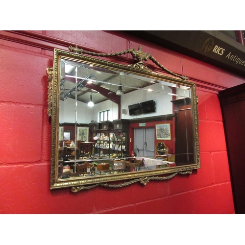 4135 - A Regency style brass effect bevel edged wall mirror, 77cm x 98cm