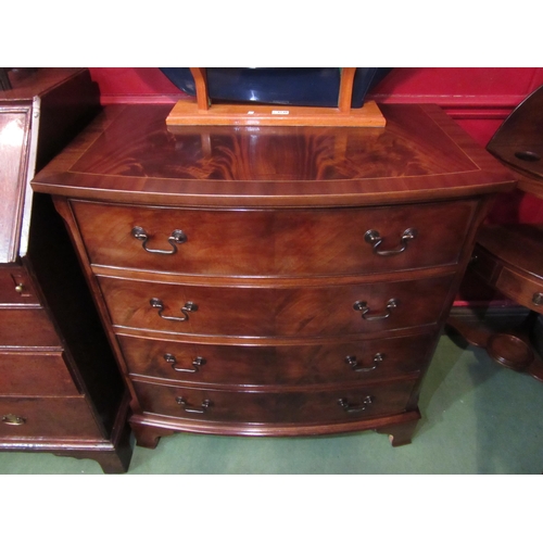 4150 - In the manner of 'Bevan & Funnell' a George III revival crossbanded flame mahogany bow front chest o... 