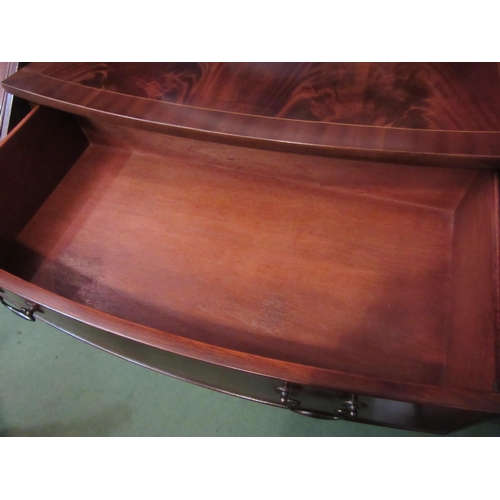 4150 - In the manner of 'Bevan & Funnell' a George III revival crossbanded flame mahogany bow front chest o... 