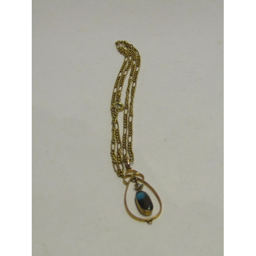 4437 - A turquoise/obsidian pendant on chain