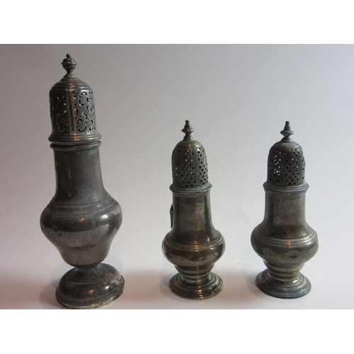 4381 - Two Georgian silver sugar castors and one later (3)