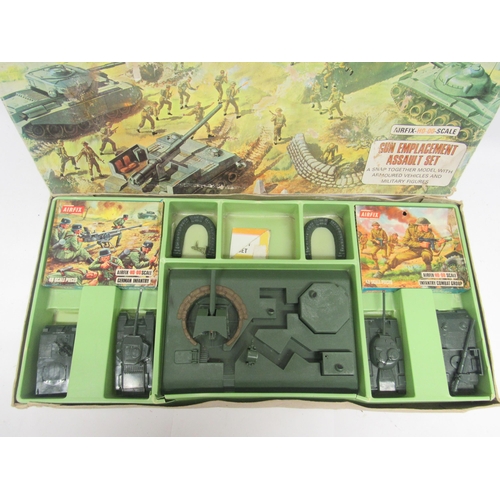 9130 - An Airfix 00/H0 scale Gun Emplacement Assault set (tape repairs and losses to box), Airfix Pontoon B... 