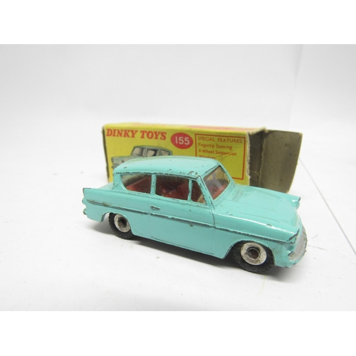 9425 - Three boxed Dinky Toys diecast model cars to include 155 Ford Anglia in turquoise with red interior ... 