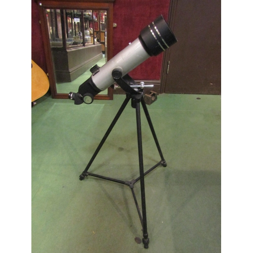 4205 - A Storm 60 telescope on tripod stand