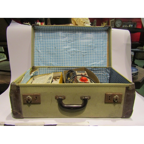 4506 - A suitcase containing '00' gauge railway items including track, locos, wagons etc.