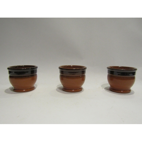 4508 - A box containing approx fifty terracotta glazed pots, 7cm tall x 8cm diameter