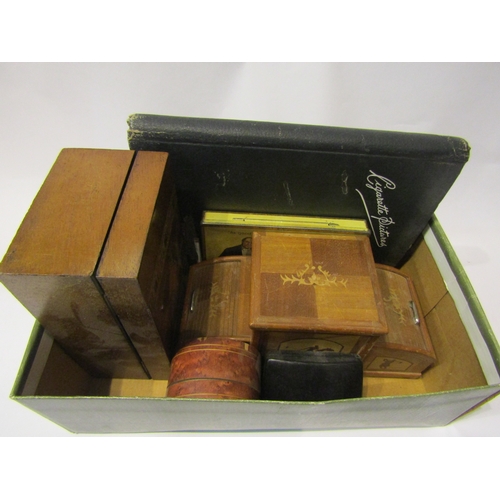 4334 - A box of miscellaneous to include wooden cigarette box with tambour sides, Ronson lighter, album of ... 