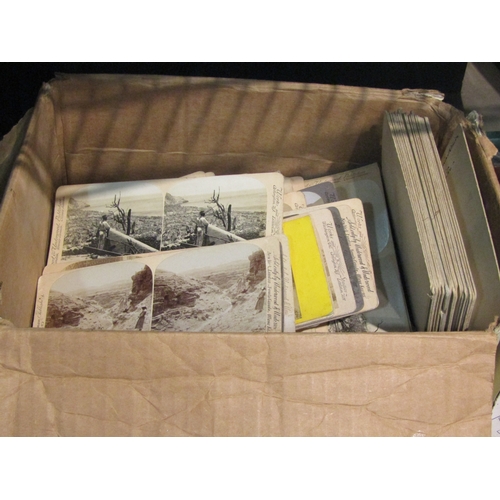 4336 - A good quantity of Stereoscope photograph cards and a viewer, topics include Russian and Japanese, w... 