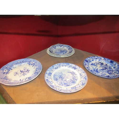 4338 - Twelve blue and white dinner plates and dishes, various designs