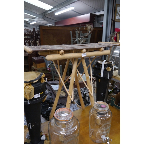 2040 - A craftsman made occassional table with hardwood frame and 'twig' shelf top.  77cm x  32cm x 76cm hi... 